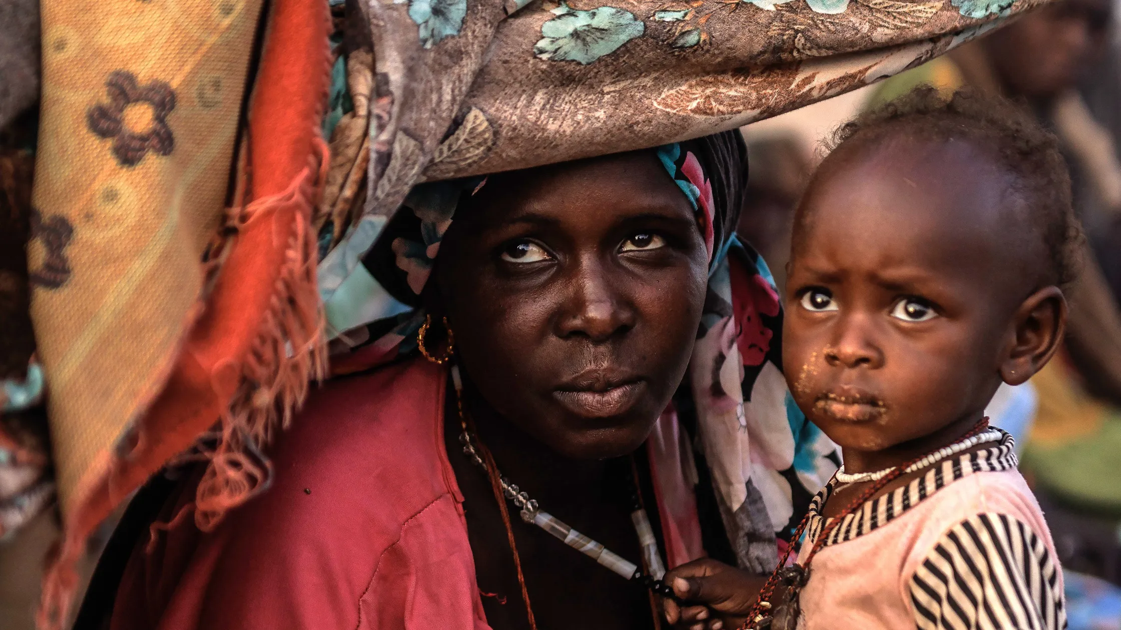 Kvinde med barn i Sudan har brug for hjælp