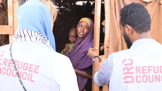 Woman refugee receiving help